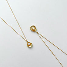 Gold seashell necklaces with pearls