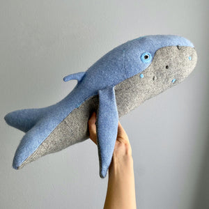 Blue and gray stuffed animal whale